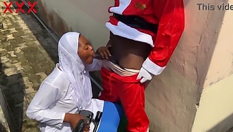 A Christmas-Themed Sexual Encounter With A Woman Wearing A Hijab And Santa Claus