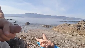 A Voyeuristic Teen Exposes Himself To A Nude Middle-Aged Woman On The Beach